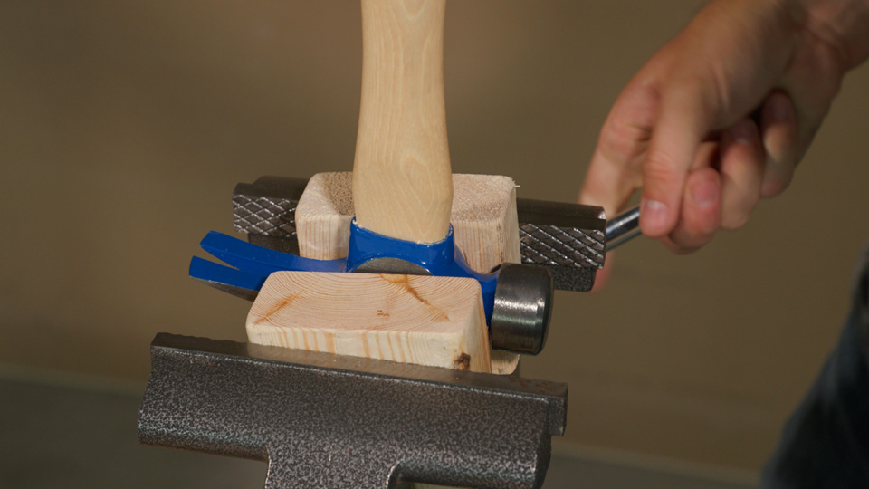 clamping the hammer in the bench vise